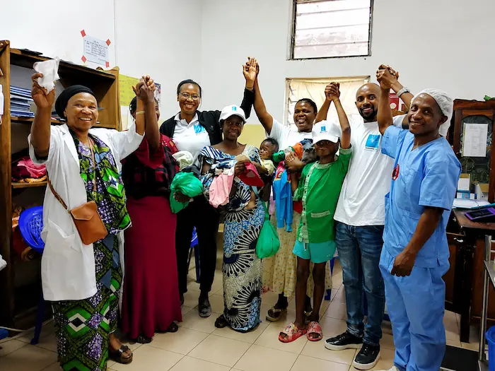 Femmes et enfants lors d’un événement communautaire à Kinshasa, RDC